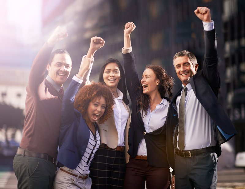 A group of excited business people.